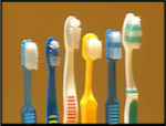 Different sizes and shapes of toothbrush heads.